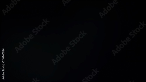 Solid black background with subtle texture, dark minimalist aesthetic backdrop, deep charcoal matte surface for copy space and design
