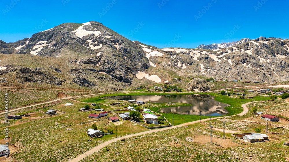 Fototapeta premium Lake Eğri which is 130 km from Alanya and 40 km from Gündoğmuş, is located at an altitude of 2100 meters on the eastern slope of Geyik Mountain at the Taurus Mountains.. If you are going from Seydişeh