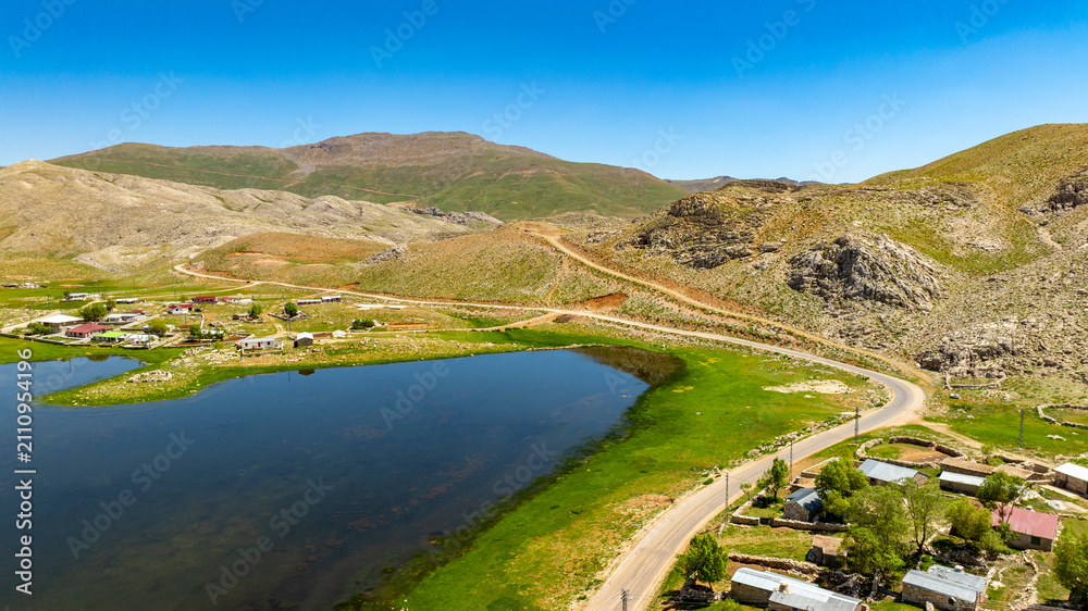 Obraz premium Lake Eğri which is 130 km from Alanya and 40 km from Gündoğmuş, is located at an altitude of 2100 meters on the eastern slope of Geyik Mountain at the Taurus Mountains.. If you are going from Seydişeh