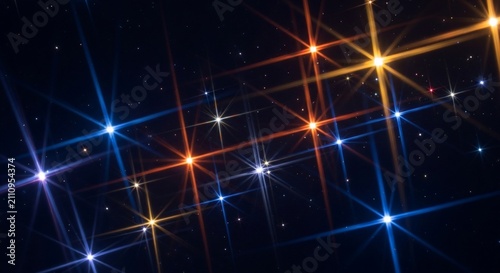 Stars twinkle with vibrant points of light across a deep black void in the vast night sky.