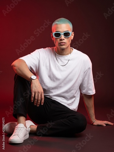 Edgy man wearing blank white t-shirt for apparel mockup