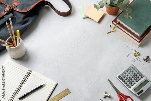 Obraz na plátně Back to school flat lay with backpack books and calculator, copy space on gray d