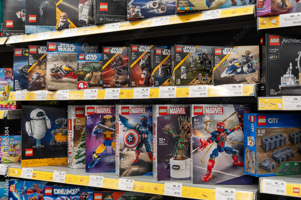 Obraz premium Boxes of Lego Star Wars, Marvel and other franchise sets displayed on supermarket shelves. Minsk, Belarus - June 10, 2026