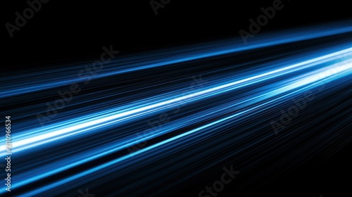 Abstract blue streaks of light motion blur on black background