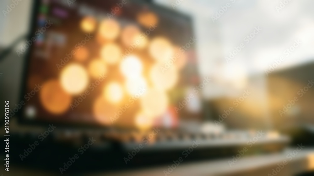 Fototapeta premium Modern AI Computer Workspace with Glowing Bokeh for Technology