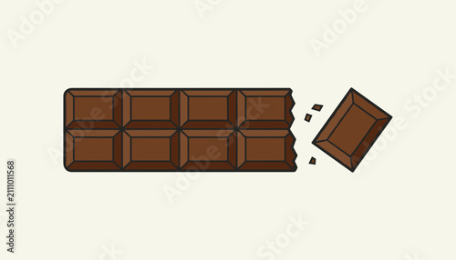 Delicious bar of milk chocolate with a single square block broken off and crumbles scattered around.