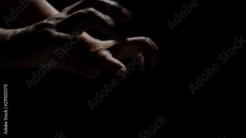 Zombie hand on black background
