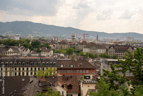 Scenic city skyline of Zurich from ETH Zurich university terrace under summer sky, Switzerland