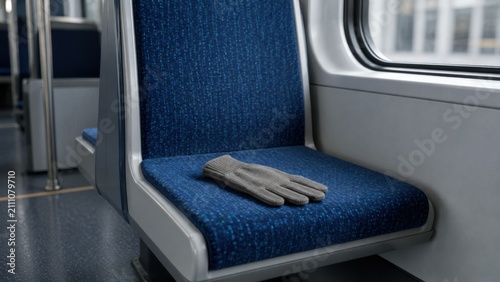Tapety artystyczne Single Glove Left on Empty Transit Seat