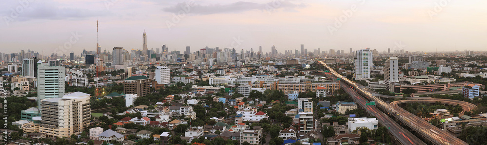 Naklejka premium High-Angle Cityscape Showing Modern High-Rises and Residential Density
