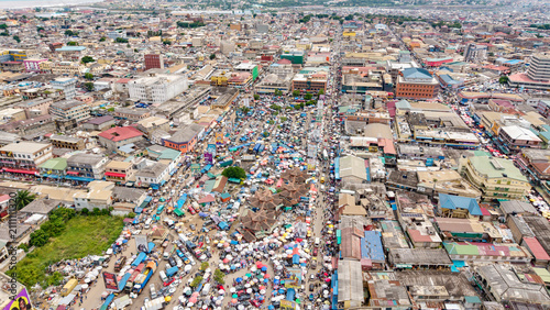 Konstfotografi Aerial view showing vibrant, crowded Makola market in accra, ghana
