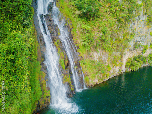 Cuadro en lienzo Aerial drone view of greenery hills with Situmurun Waterfall near Toba Lake at L
