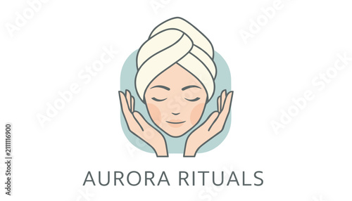 Elegant Aurora Rituals wellness logo featuring a beautiful woman's face with a spa towel wrapped around her head.