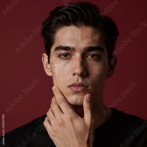 Photorealistic Collage Animal. Trendy Urban Magazine-Style Collage Of A Male Head And Hand Against Dark Red Background