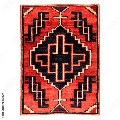 Traditional tribal geometric area rug with bold red background, black stepped diamond medallion, and Aztec ethnic motifs.