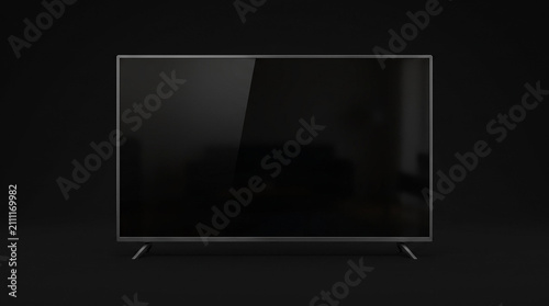 Modern flat screen smart television on black background.