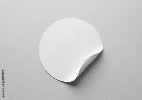 Blank white round adhesive paper sticker with a curled corner for your custom branding and design