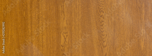 Natural oak wood texture tabletop background with warm wooden surface and sub...