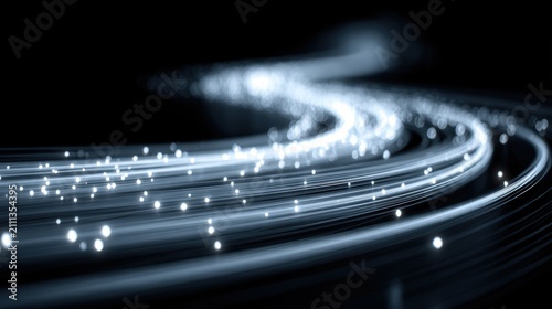 Abstract Glowing Light Trails And Digital Data Flow Particles On A Dark Background With Motion Blur