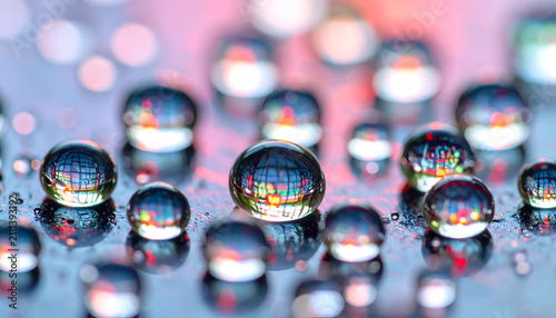 Macro Photography of Water Droplets Reflecting Colorful Lights.
