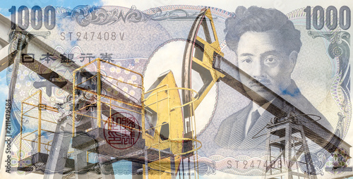 Collage of japanese yen banknote and crude oil pumps. Petroleum, petromoney and crude oil concept
