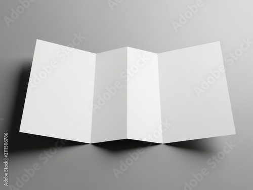 A blank white four panel accordion fold brochure mockup on grey background