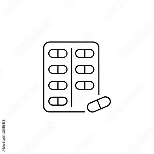 Blister pack with oblong tablets and one loose capsule represents pharmaceutical packaging and mixed oral medication forms