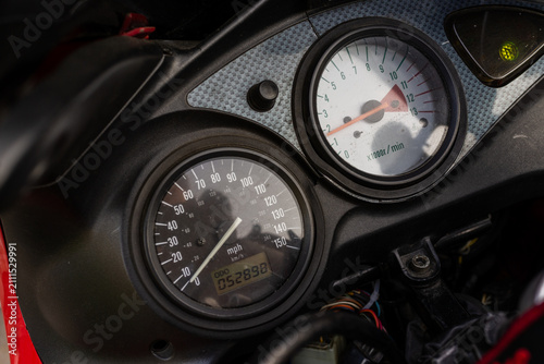 Bild auf Leinwand Motorbike dashboard shows speedometer and tachometer