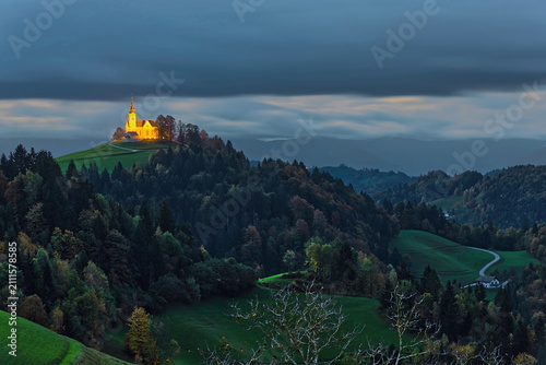 Bild auf Leinwand Illuminated, hilltop St