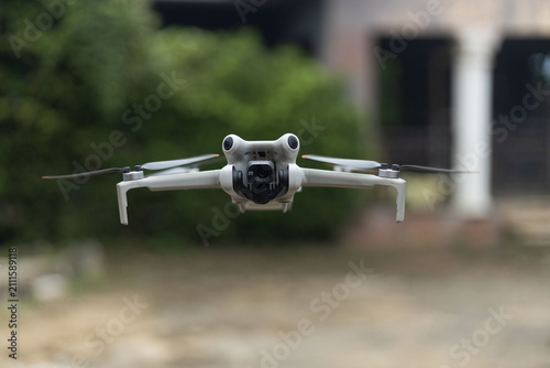 A drone device suspended in air