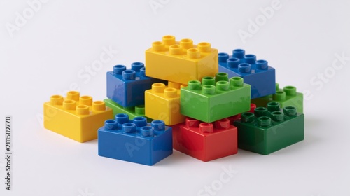 Pile of Colorful Plastic Building Blocks on a White Background