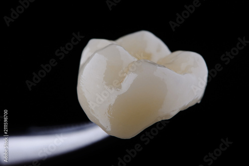 Konstfotografi High-quality zirconia dental crown on white background