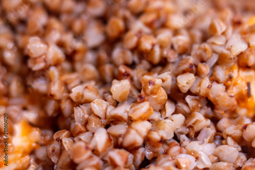 Konstfotografi Cooked buckwheat groats with tasty vegetables in a bowl for healthy breakfast or
