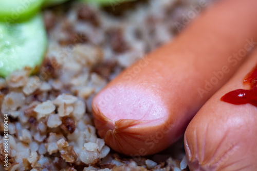 Konstfotografi Delicious sausages served with cooked buckwheat and fresh slices for a healthy b