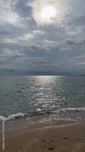 Sun reflection soft wave beach