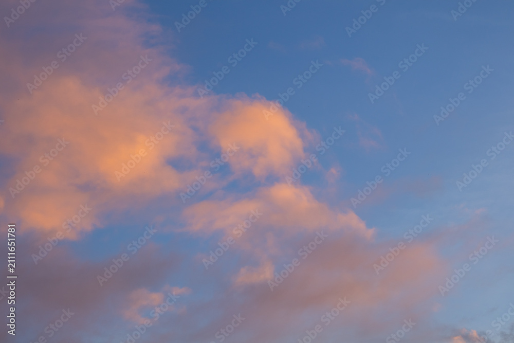 Fototapeta premium Pink Clouds in Blue Sky