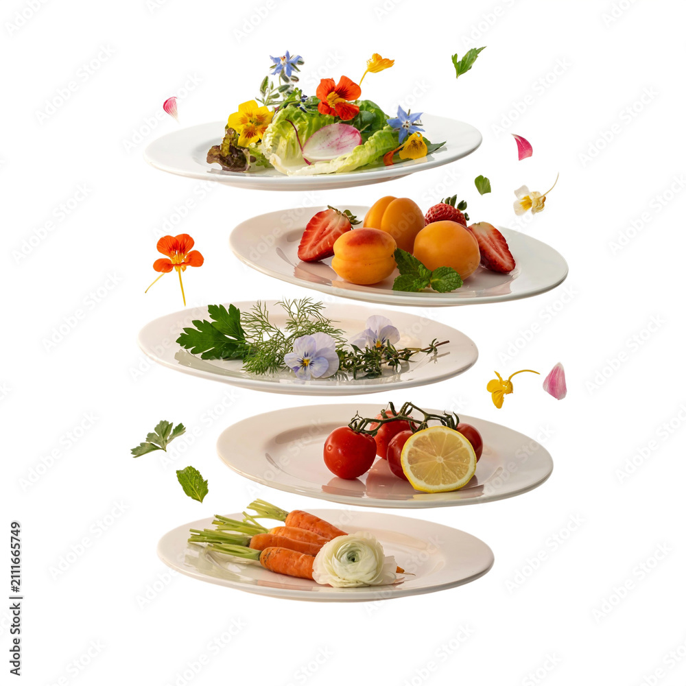 Obraz premium A collection of five plates displaying fresh ingredients and prepared dishes, with delicate flowers and leaves scattered around.