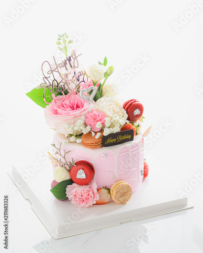 bouquet of roses on birthday cake