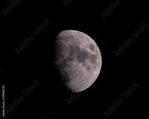 Canvastavla A detailed view of the waxing gibbous Moon reveals craters, rugged highlands, an