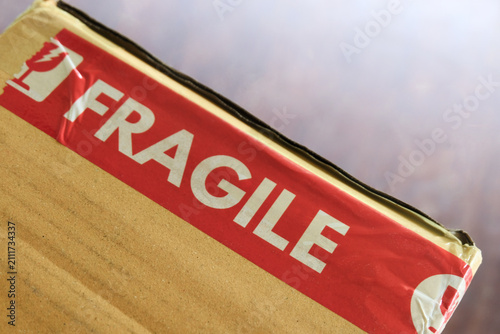 Fragile Label on Cardboard Shipping Box Close Up