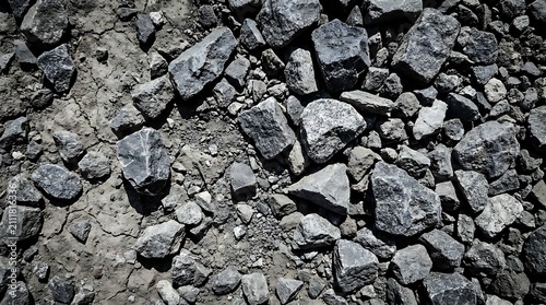 Crushed rock and gravel textured background with natural light
