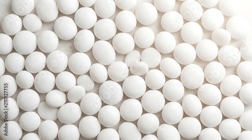 Round white objects scattered abstract background health concept