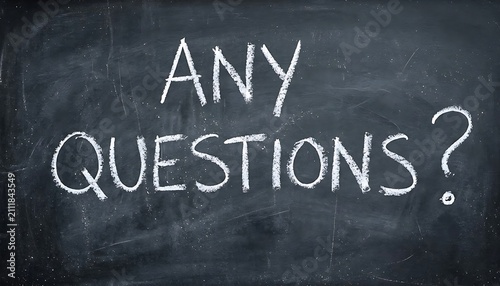 Handwritten any questions text on a chalkboard with a dark gray background for education concepts
