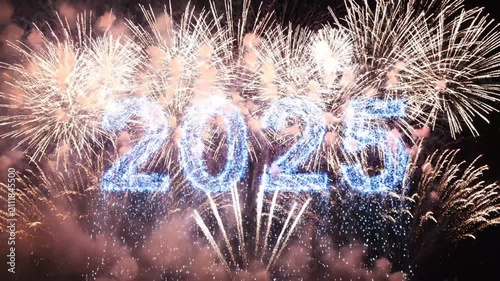 Sparking blue 2025 numbers with festive fireworks at night.