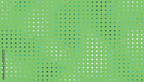 фотографія Polka dots in varying shades of green create a soft and textured gradient pattern across the entire frame