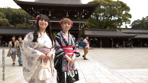 Принти на полотні Two Japanese Women in Traditional Kimono at Meiji Jingu Shrine