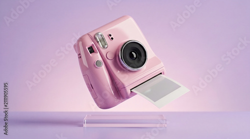 3D render model of a pastel pink instant camera displaying a printed photo on a podium against a purple background
