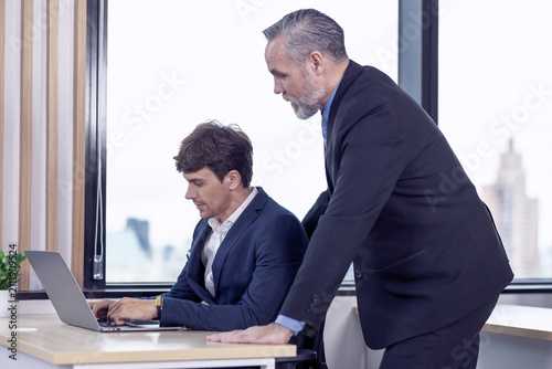 Leadership, business man boss and corporate director working with vision, success and motivation in company office. Portrait of senior executive ceo, happy professional entrepreneur and smile manager