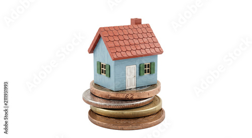 Canvastavla Miniature house perched atop a stack of British pound coins, symbolizing housing