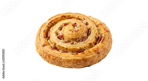 Fotografie Golden baked ham and cheese swirl pastry with herbs on a white background